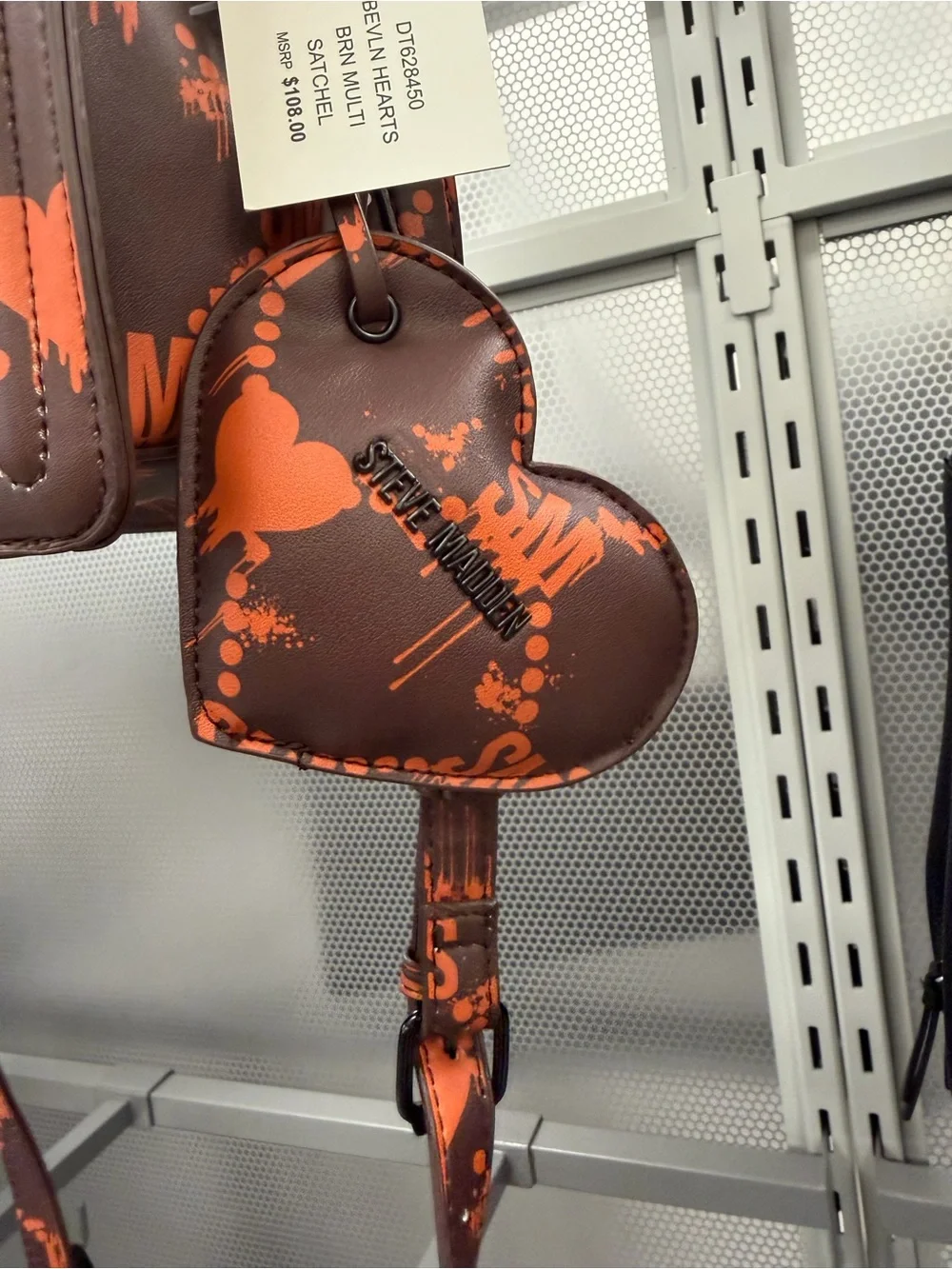 Steve Madden Bleeding Heart Bevln  Crossbody Bag in Brown with Orange Print